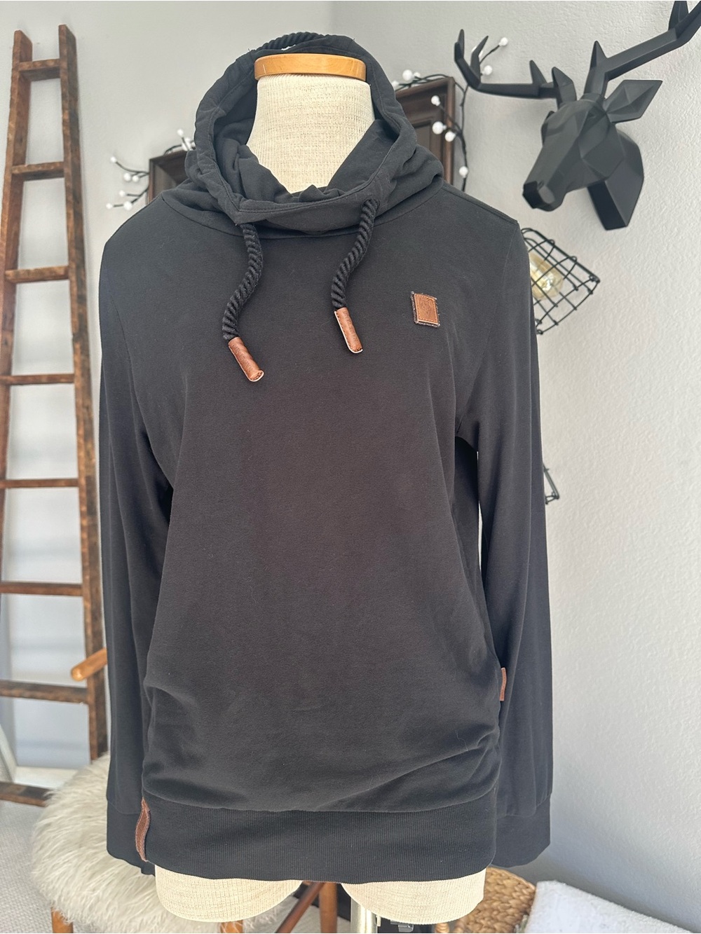 Naketano black hoodie with brown accents, size medium